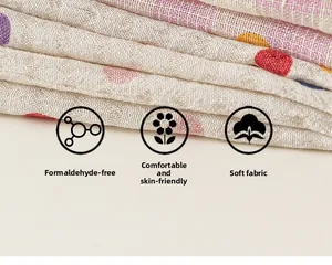 Vue détaillée du tissu en gaze de coton doux et respirant avec des pois colorés