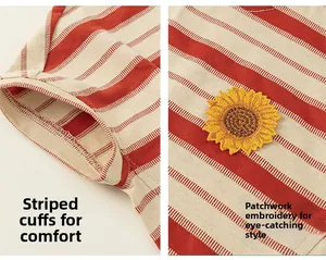 Détail d'un débardeur à rayures rouges avec broderie tournesol et emmanchures côtelées