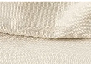 Close-up of beige cotton canvas fabric texture with detailed weave for kids cargo shorts