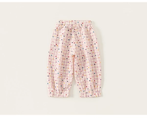Détails du pantalon vichy rose pour enfant avec pois colorés et poignets élastiques