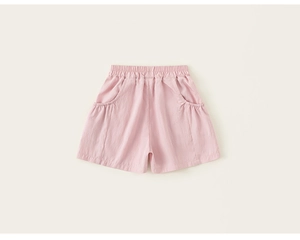 Detail of pink summer shorts for girls featuring elastic waist and ruffled side pockets