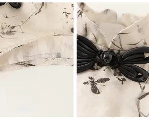 Detail of Chinese style sleeveless dress featuring ink wash print and bow knot button