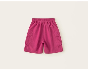 Detail of rose red cargo shorts for kids with elastic waist and large side pockets
