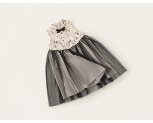 Detail of girls' Chinese style sleeveless dress with black ink floral print and mesh skirt