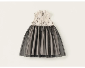 Detailed view of the sleeveless summer dress with ink painting and black mesh tulle skirt