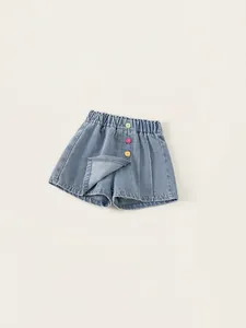 Gonna-pantalone in denim azzurro per bambina con elastico e bottoni colorati decorativi