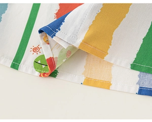 Detail of colorful striped cotton hem with a cute sun print and neat rolled edge stitching