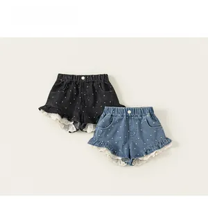 Details von Mädchen Denim-Shorts mit Polka-Dot-Print und Spitzenbesatz in zwei Farben