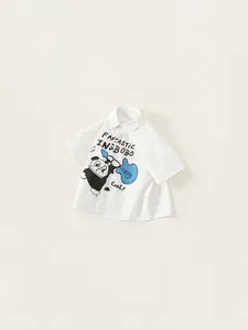 White short-sleeve shirt for boys featuring a cartoon dog guitar print and lapel collar