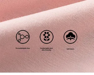 Makro-Detail von weichem rosa Strickstoff zeigt atmungsaktive Textur und hautfreundliche Fasern