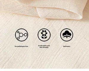 Macro d'un tissu textile crème sûr et doux pour la peau avec une texture délicate