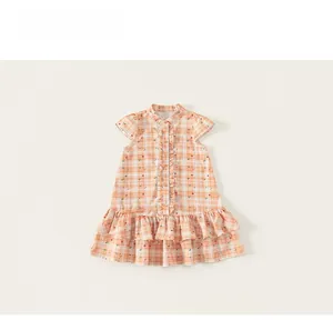 Detailed view of kids orange plaid floral dress with ruffled collar and button front
