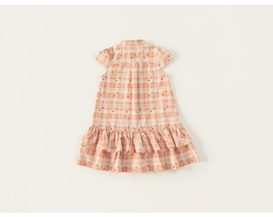 Detail of girls floral plaid dress with ruffle hem and small collar for summer