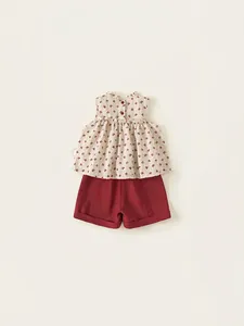 Girl's summer floral sleeveless ruffle top and red cotton linen shorts two-piece set