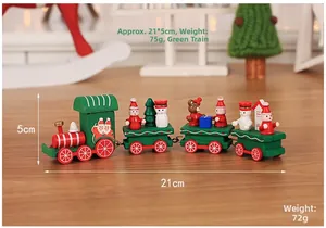 Detailed view of the 21cm green wooden Christmas train with festive miniature figures