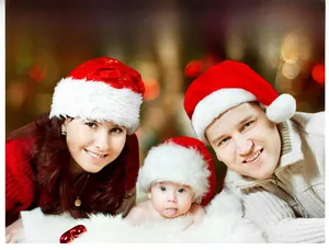 Matching Christmas hat set for adults and babies made of soft red plush fabric with white trim