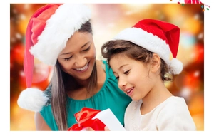 Matching plush red and white Santa hats for adult and child in festive scene