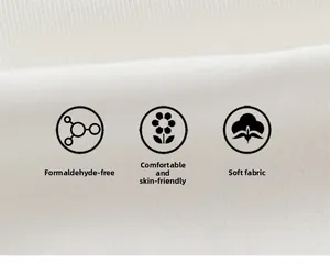 Close-up of white knitted cotton fabric showing soft texture and high-quality stitching