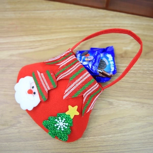 Christmas gift bag in red felt with Santa Claus and sequin tree decorations