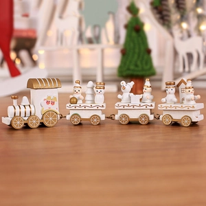 Handcrafted four-section white and gold wooden Christmas train set with festive figurines