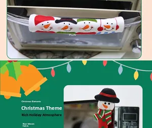Detailed view of Christmas snowman handles covers for microwave and oven appliances