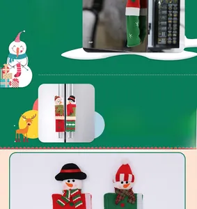 Detailed view of plush snowman Christmas microwave handle covers in festive red and green