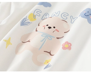 Close-up of cute cartoon bear print with fancy text on white kids cotton t-shirt