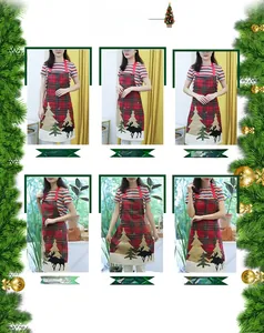 Detail of red plaid Christmas apron featuring reindeer and tree embroidery on knit fabric