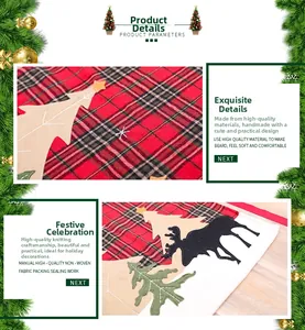 Detail of Christmas apron with red plaid fabric, reindeer patch and festive stitching