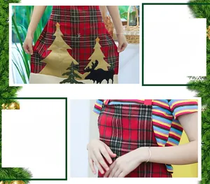 Detail view of red plaid Christmas apron with reindeer embroidery and white plush trim
