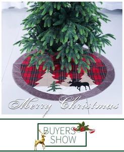 Detail of red and black buffalo plaid Christmas tree skirt with reindeer and tree patches
