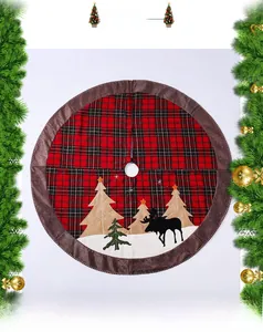 Detail showing red black buffalo plaid Christmas tree skirt with reindeer applique