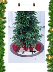 Detail of red and black buffalo plaid Christmas tree skirt with festive reindeer embroidery