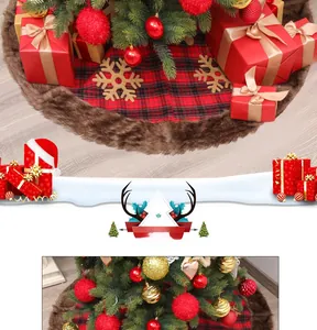 Detail of red and black plaid Christmas tree skirt with faux fur edge and gold snowflake