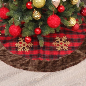 Red and black plaid Christmas tree skirt with brown faux fur trim for festive decor