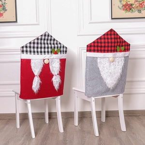 Christmas gnome chair covers with red and grey plaid hats for festive home dining decor