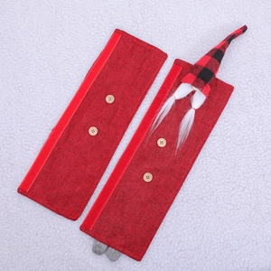 Christmas gnome refrigerator door handle covers in red fabric with plush white beard detail