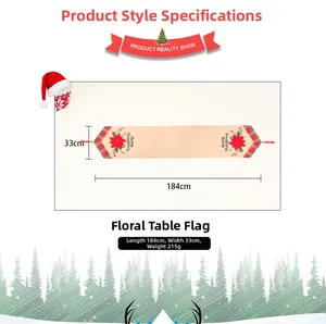 Close-up of burlap Christmas table runner with red poinsettia and Merry Christmas text