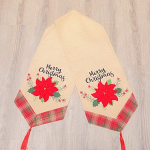 Linen Christmas table runner with red poinsettia flowers and green plaid edges