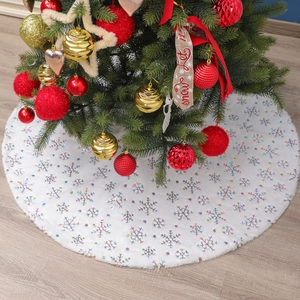 White faux fur Christmas tree skirt featuring holographic sequin snowflake patterns