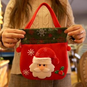 Sac-cadeau de Noël avec applique Père Noël 3D et motifs de flocons de neige