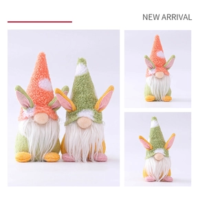 Detailed view of handmade Easter bunny gnomes with carrot theme and plush lamb wool texture