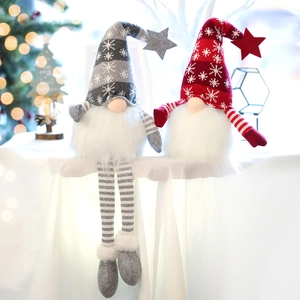 Gnomi di Natale luminosi in peluche con lunghe gambe a righe e barba bianca