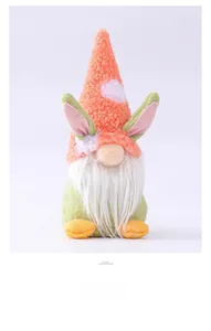 Detail of Easter gnome featuring plush bunny ears, orange hat and long white beard decor