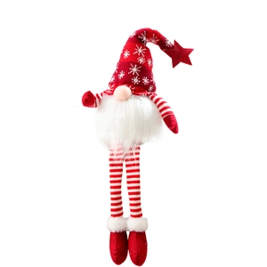 Gnomo di Natale in peluche con cappello rosso a fiocchi e lunghe gambe a righe