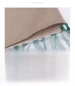 Detail showing high-quality linen canvas and green striped fabric stitching on Christmas chair cover