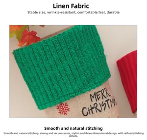 Detail der strapazierfähigen Leinen-Weihnachtssocke mit grünem Strickbündchen und Mustern