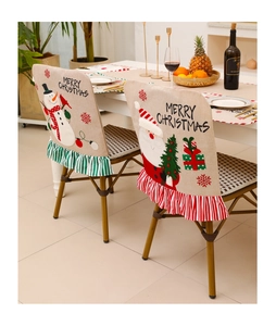 Detailed embroidery of Santa Claus and Snowman on linen Christmas chair covers