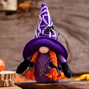 Handcrafted Halloween purple gnome decoration with orange braids and spider accent for party