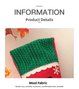 Detail of green knit cuff and red felt Christmas stocking with snowflake sequins